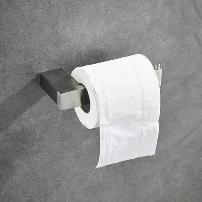 Modern brushed stainless steel toilet paper holder with sleek rectangular design in a bathroom hardware set
