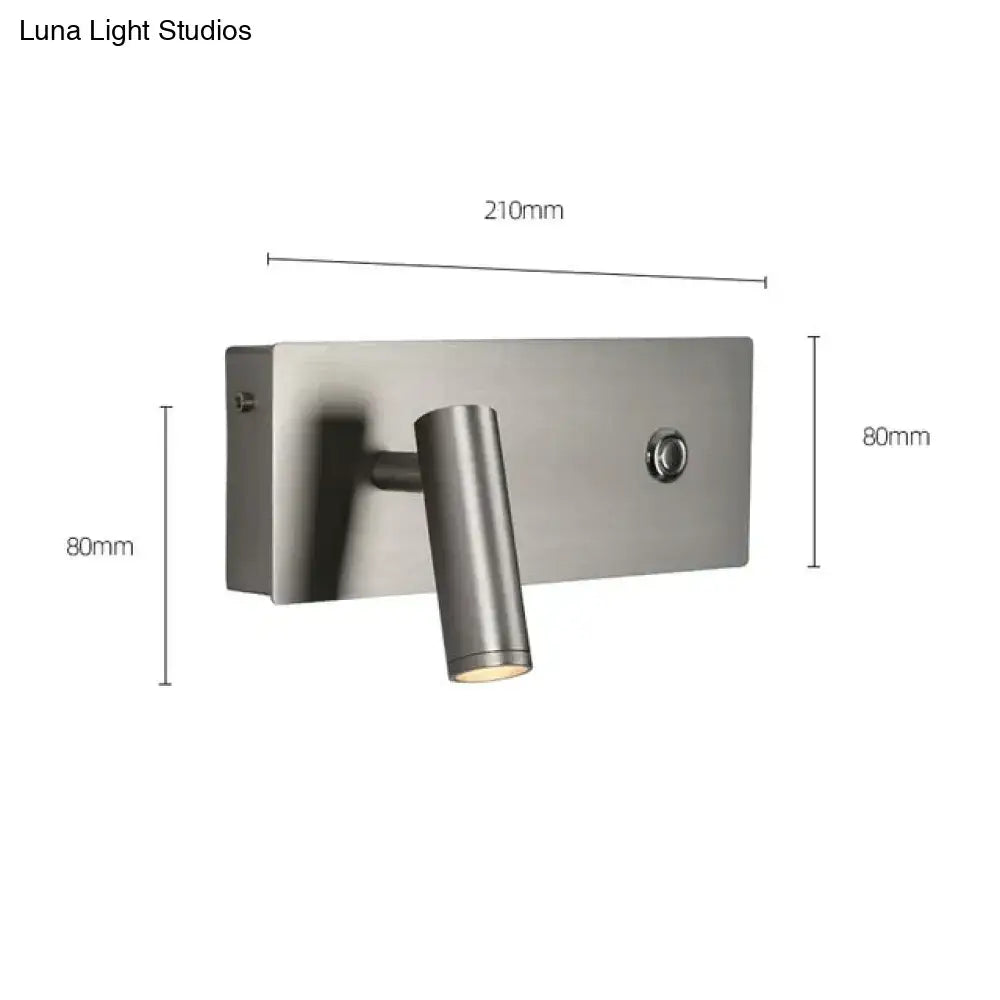 Modern brushed nickel led dimmable reading wall light with a sleek cylindrical head and rectangular base for bedroom use