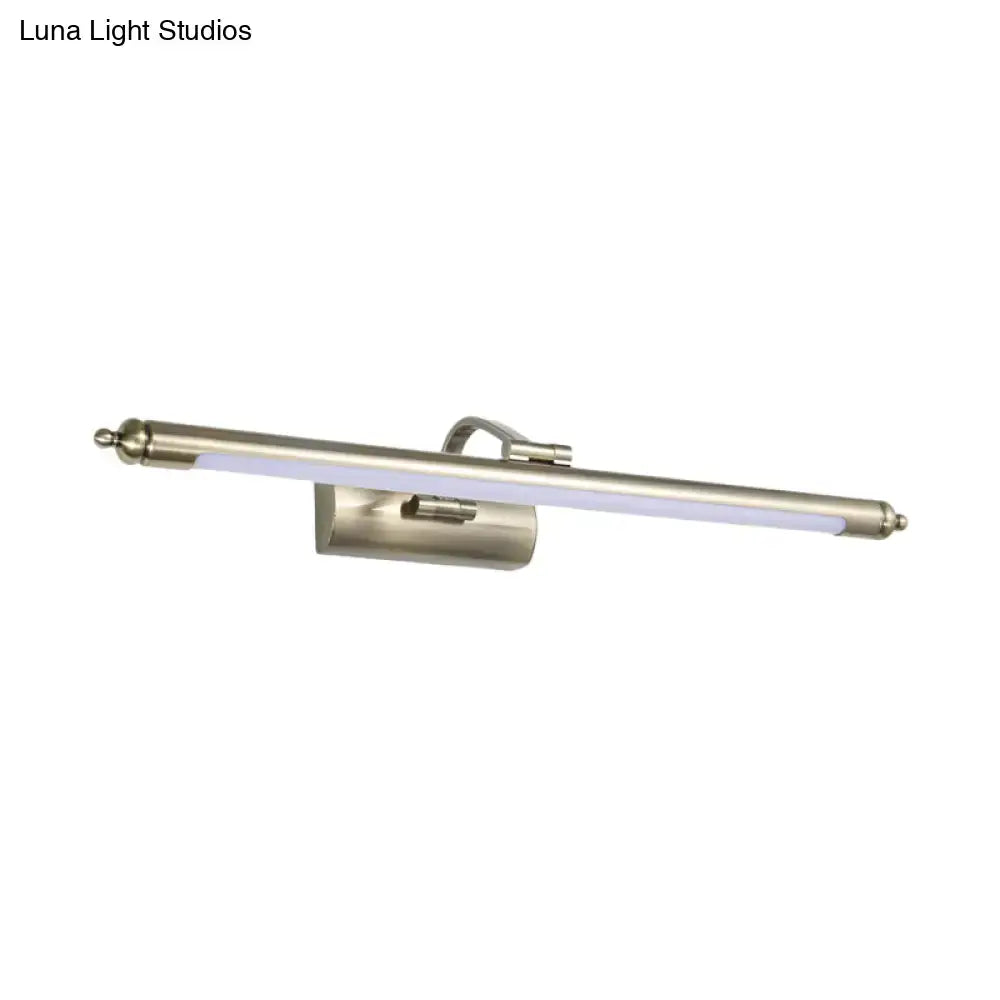 A sleek modern brushed nickel led wall sconce with a rectangular bar and finials emitting warm white light