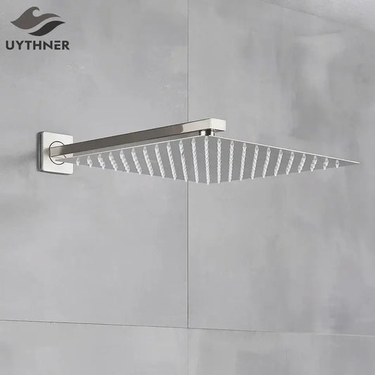 Modern brushed nickel stainless steel square rainfall shower head with sleek design and evenly spaced nozzles for rainfall shower