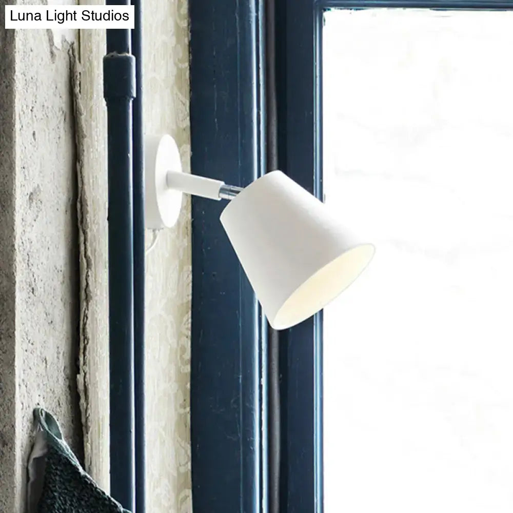Modern brushed nickel tapered wall sconce wall light sconce in white with a sleek minimalist cylindrical design
