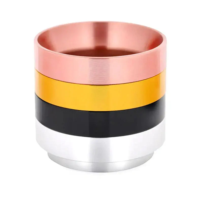 Modern brushed stainless steel espresso dosing ring with a four-tiered tamper in rose gold yellow black and silver colors