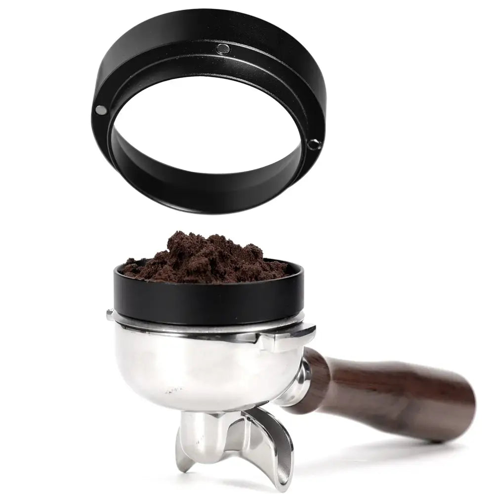 Black metal coffee tamper with wooden handle beside silver portafilter filled with ground coffee featuring espresso dosing ring