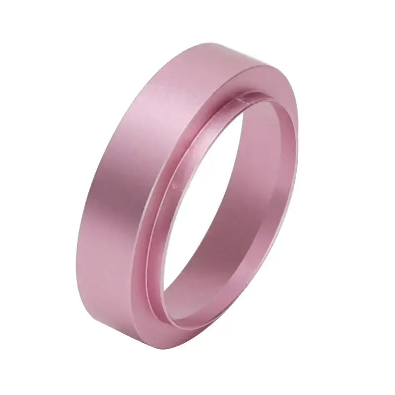 A sleek matte pink metallic espresso dosing ring made of modern brushed stainless steel for decorbites espresso dosing