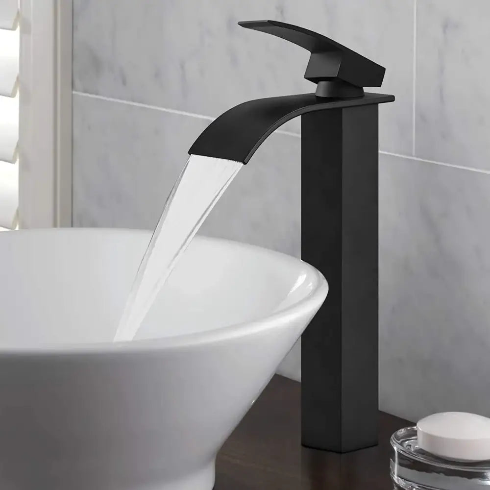 Modern brushed stainless steel basin faucet with black matte finish and sleek decorbites brass waterfall design