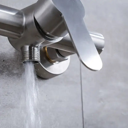 Modern brushed stainless steel bathroom faucet with sleek single lever handle for shower mixer use in white ceramic settings