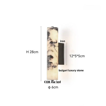 A tall slender decorbites bulgari stone led wall light with polished white and black marbled alabaster stone body and iron plate