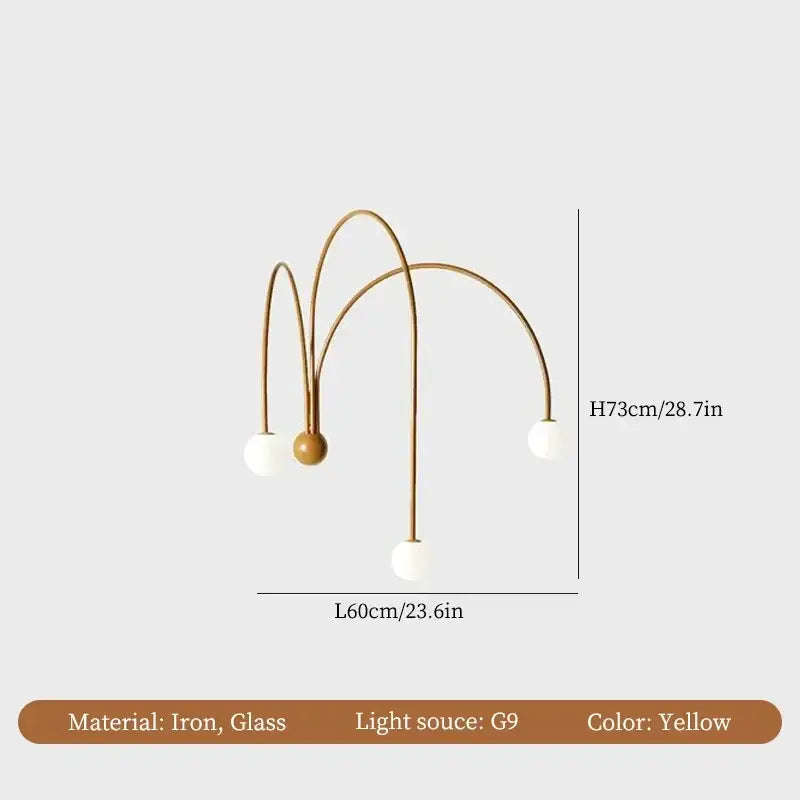 Yellow modern arched floor lamp with decorbites iron glass features complementing burgundy iron glass led wall light