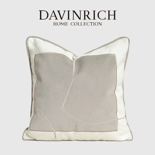 A modern cappuccino tone geometry embroidery pillow from decorbites featuring light gray and off-white fabric panels