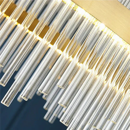 Modern cascading gold crystal pendant chandelier with clear glass prisms and gold-toned metal accents for dining room decorbites crystal pendant