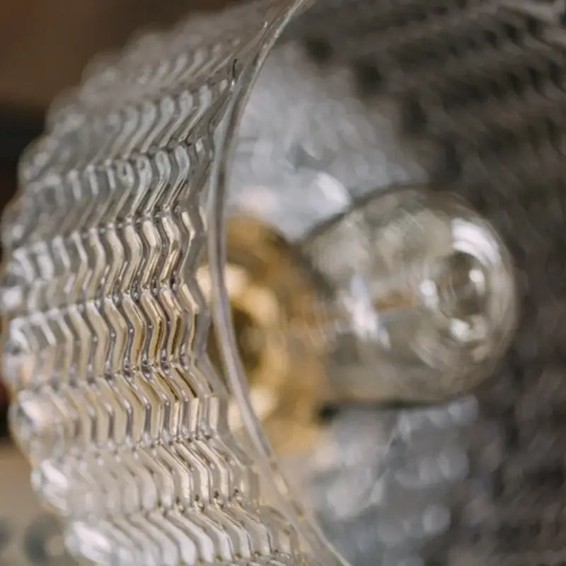 Modern chevron clear glass led pendant light with a textured wavy clear glass lampshade and brass hardware decorbites clear glass
