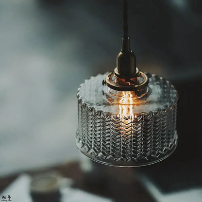 Modern chevron clear glass led pendant light with textured zigzag pattern and brass-toned decorbites clear glass fixture