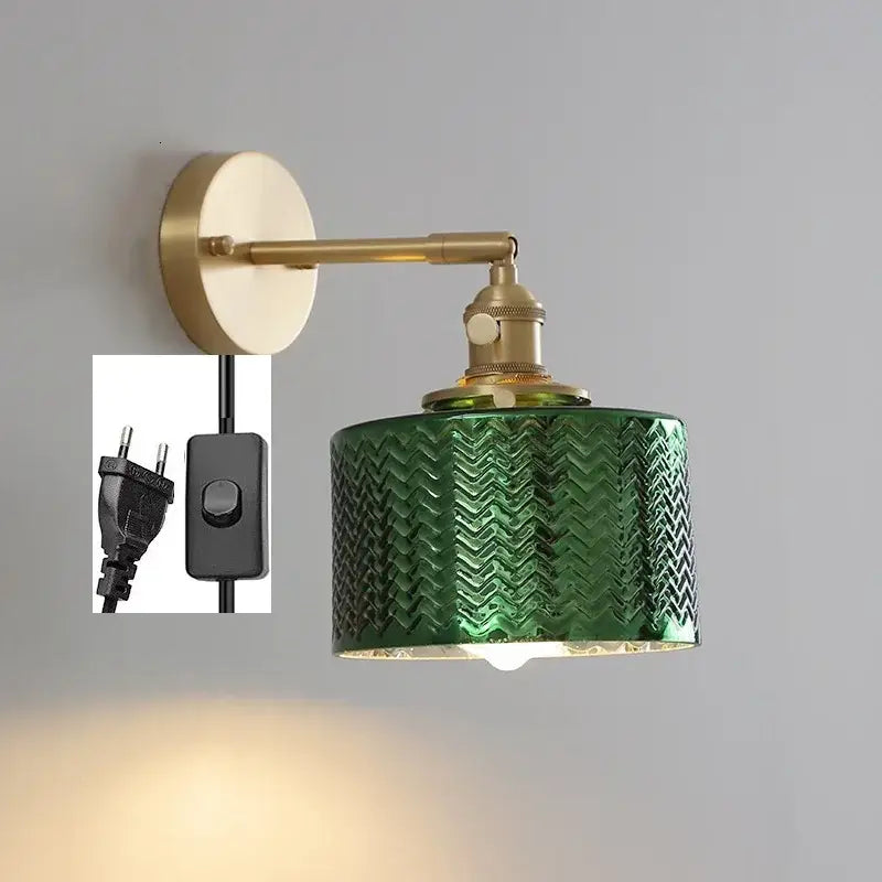 Modern chevron green glass led wall light with zigzag patterned lampshade and brass hardware for bedroom use
