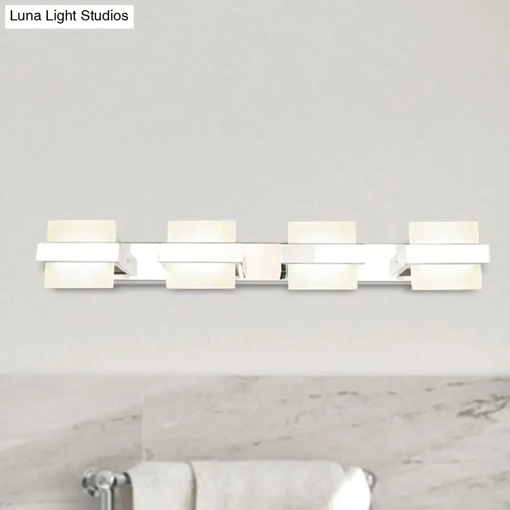 Modern chrome vanity wall light with four rectangular frosted acrylic panels for bathroom use