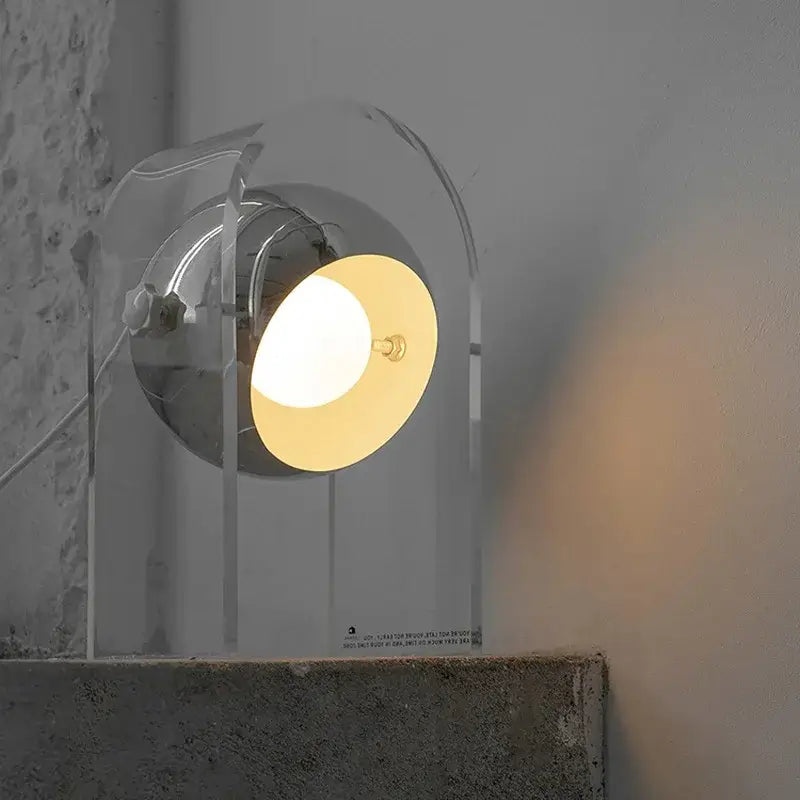 Modern chrome acrylic led desk lamp with wall-mounted spotlight and warm circular light beam for bedroom decorbites acrylic led