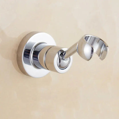 Modern chrome adjustable handheld shower holder mount with wall-mounted robe hook and circular base for bathroom use