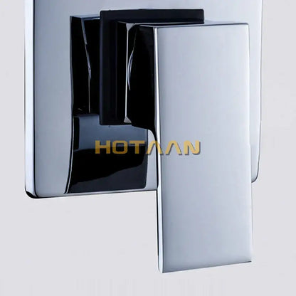 Modern chrome and black square shower mixer valve with sleek rectangular design and chrome-finished wall-mounted faucet