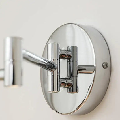 Modern chrome and ceramic iron wall light with adjustable articulated arm and dual-sided magnifying mirror for decorbites iron wall light