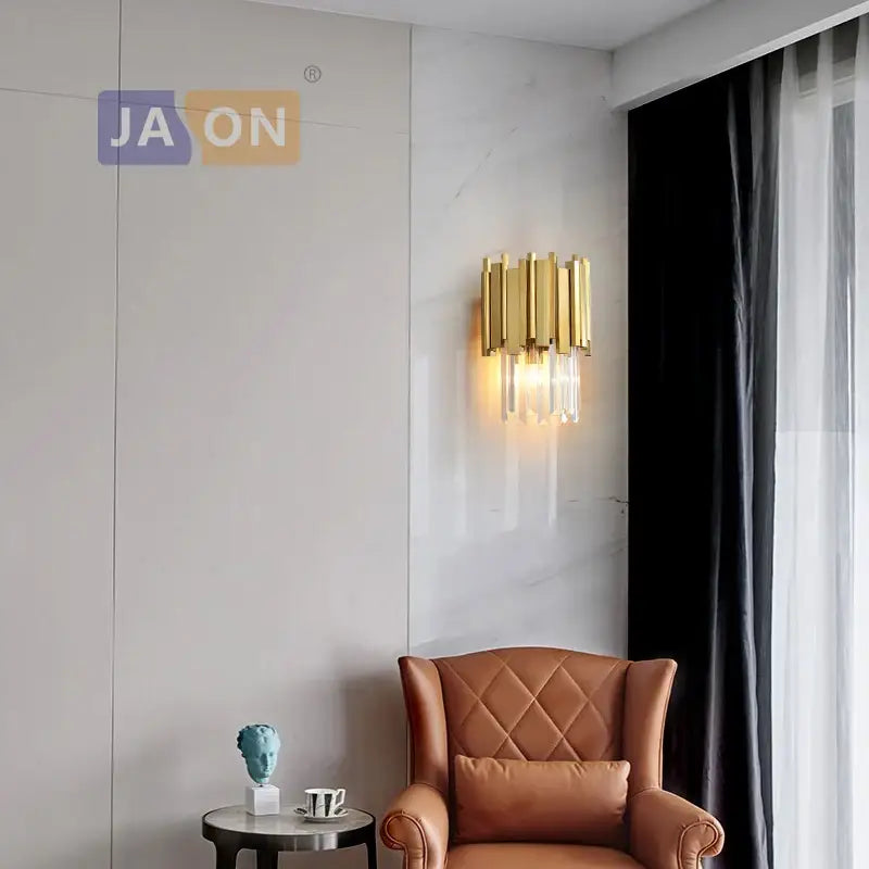 Modern chrome and gold decorbites crystal clear led wall sconce with gold-toned vertical bars and crystal clear accents
