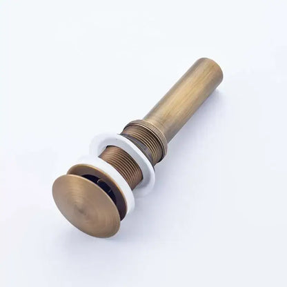 Antique brass bathroom sink pop with white ceramic flange and threaded metal body for modern chrome and gold bathroom sink stopper