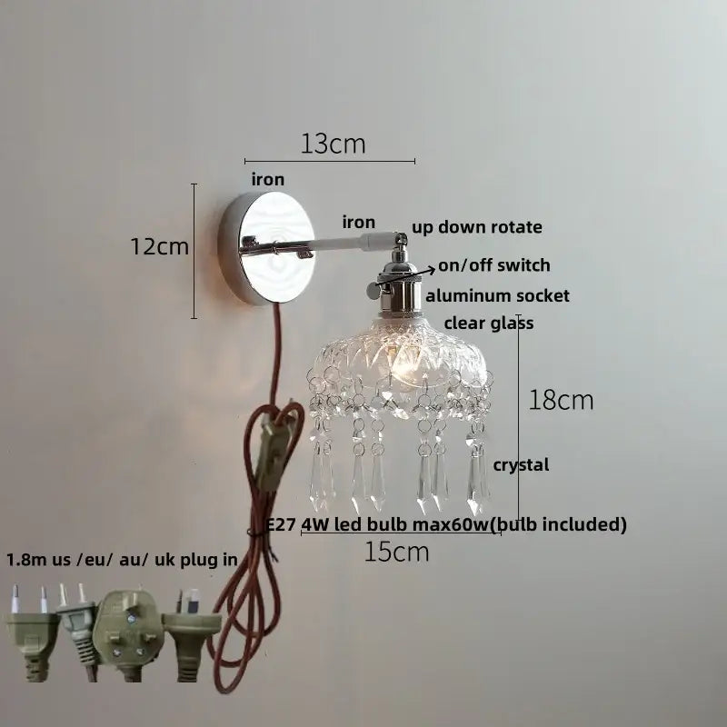 Modern chrome and perforated fabric wall light fixture with polished iron base and crystal-adorned glass shade