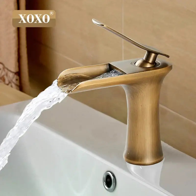 Antique brass decorbites copper waterfall vanity faucet with sleek modern design and smooth curved spout for bathroom tap