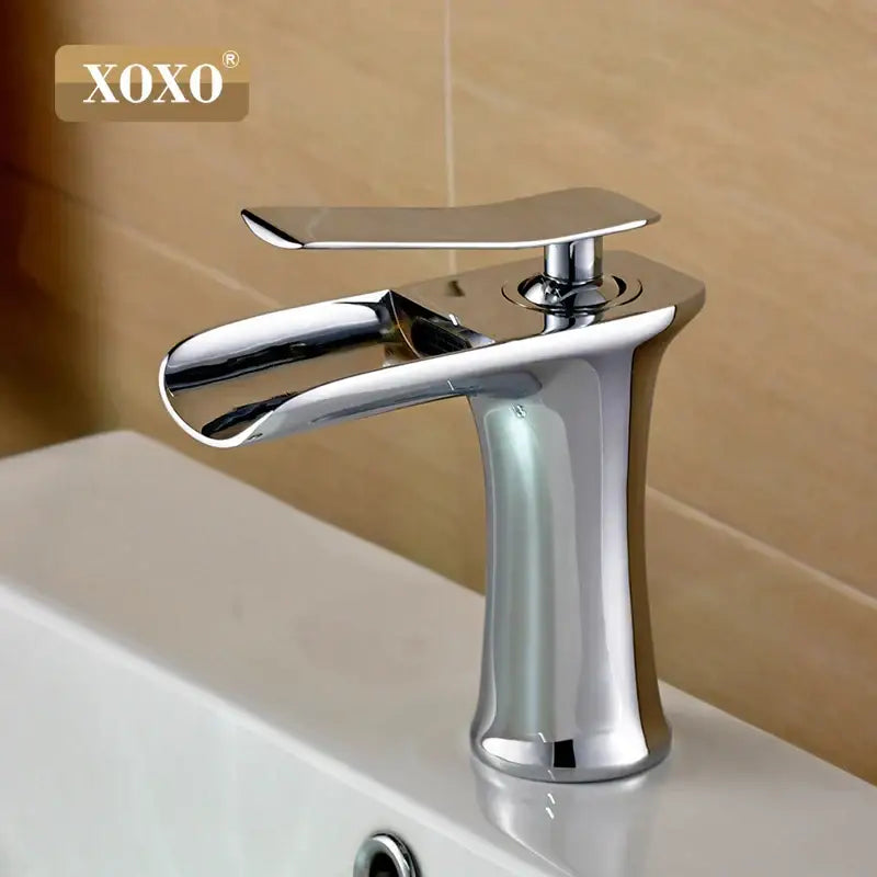 Modern chrome and white copper waterfall vanity faucet by xoxo with sleek curved spout and flat handle for copper waterfall vanity decorbites