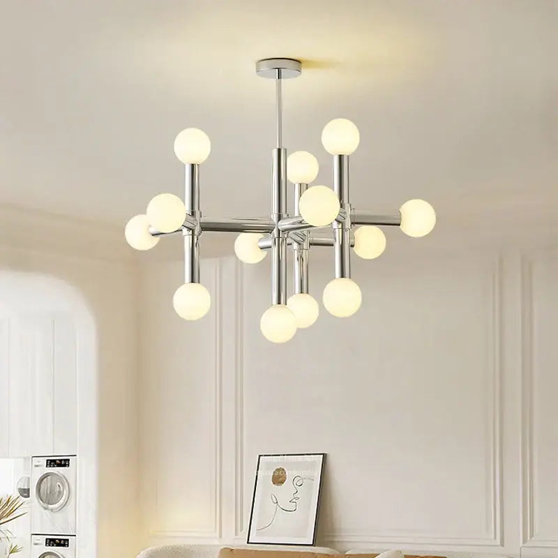 Modern chrome bauhaus glass hanging ceiling lamps with frosted globe bulbs in a geometric branching design for living room