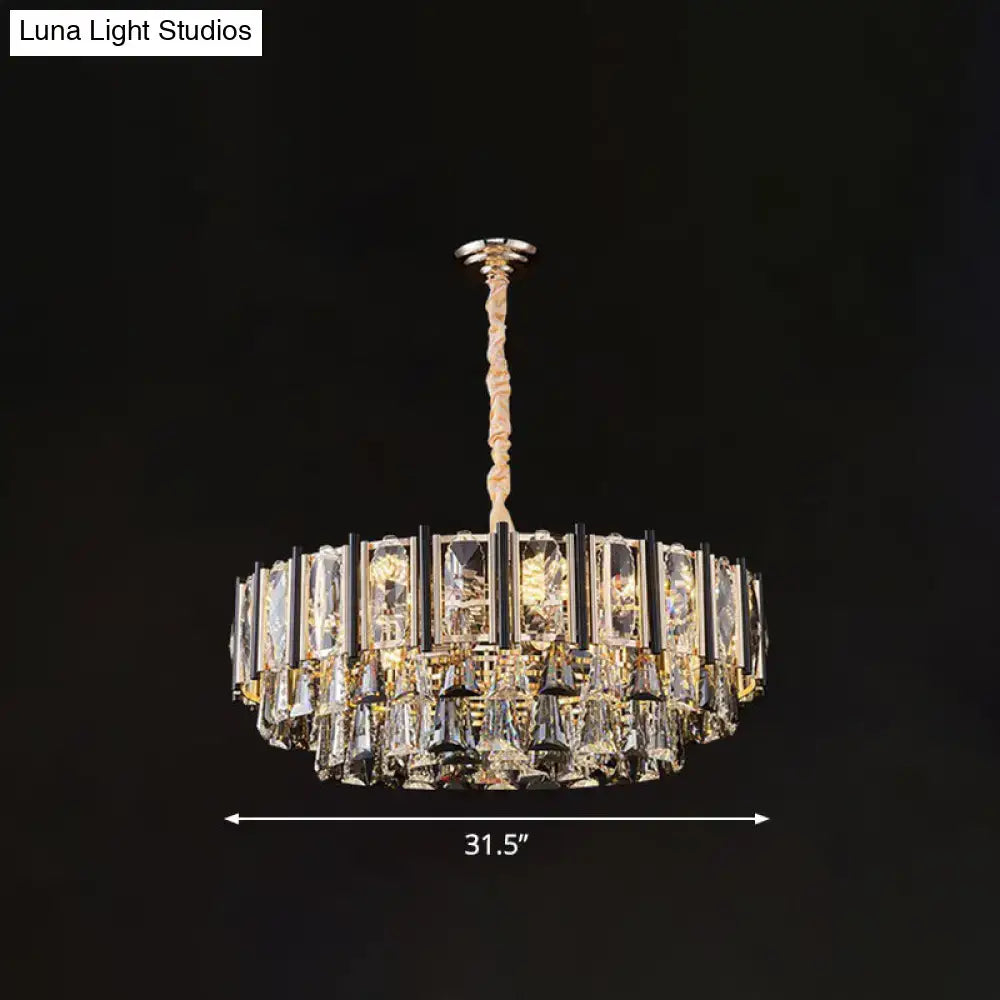 A modern crystal chandelier by decorbites with gold frame and clear crystals featuring adjustable chain cord length
