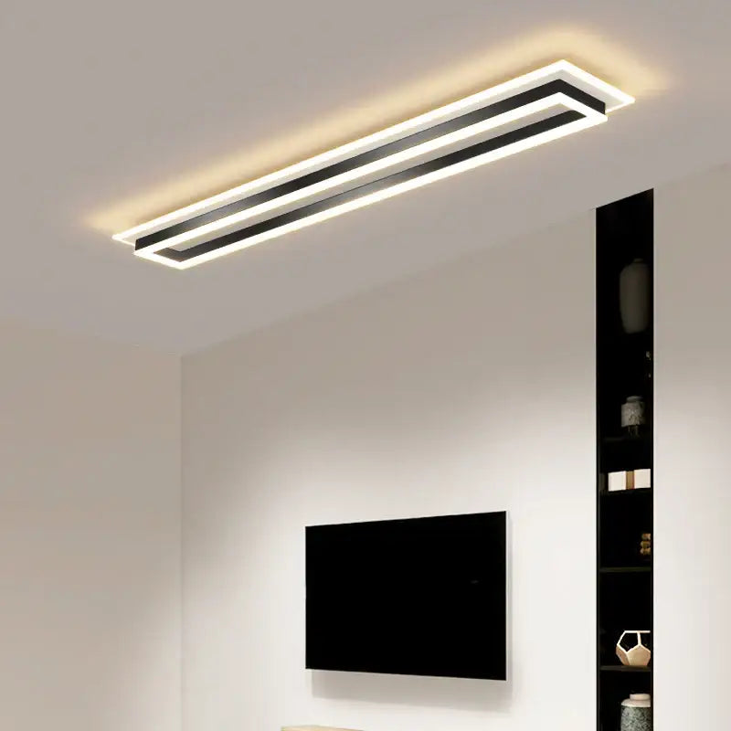 Modern chrome and black rectangular dimmable led chandelier with sleek design emitting warm ambient light for living room decorbites dimmable led