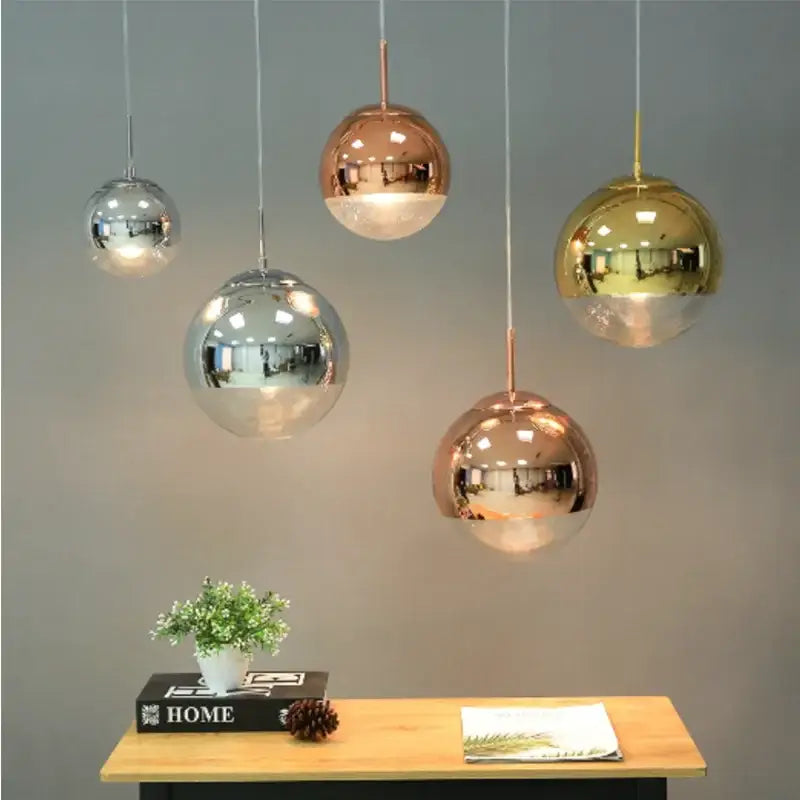Modern chrome and copper glass ball led pendant light with silver, rose gold, and brass finishes for dining room