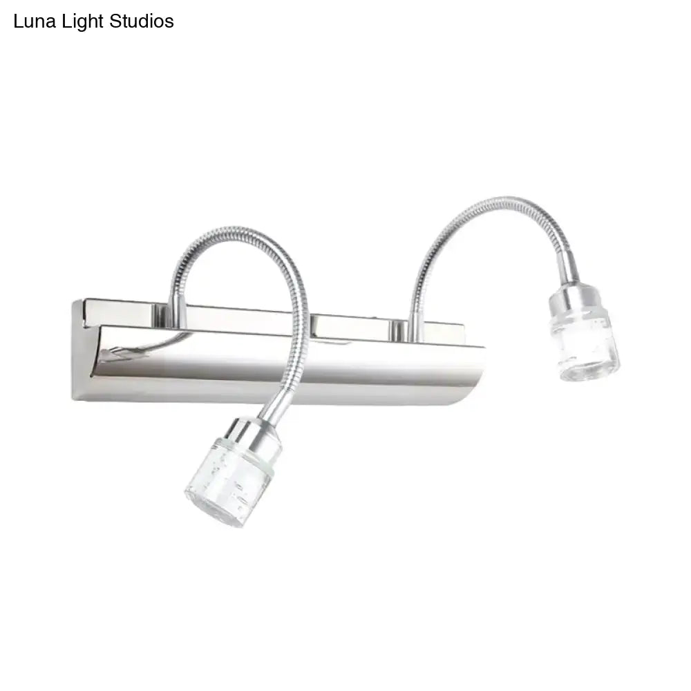 Modern chrome crystal cylinder vanity wall sconce with two flexible gooseneck arms and clear crystal cylinder lamp heads