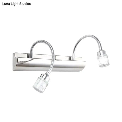 Modern chrome crystal cylinder vanity wall sconce with two flexible gooseneck arms and clear crystal cylinder lamp heads
