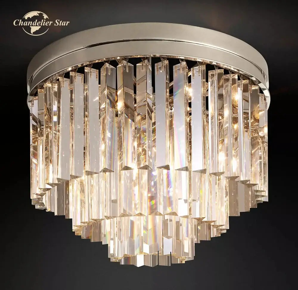 Modern chrome crystal flushmount chandelier with clear faceted glass prisms and sleek circular frame ceiling light decorbites