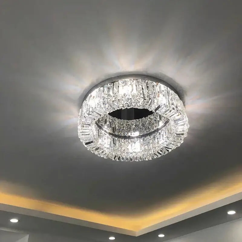Modern chrome crystal led ceiling lamp with circular frame and faceted crystals for living room decorbites ceiling lamp