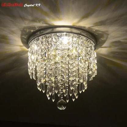 Modern chrome crystal led ceiling light with sleek chrome base and cascading clear crystal droplets for living room decorbites crystal led