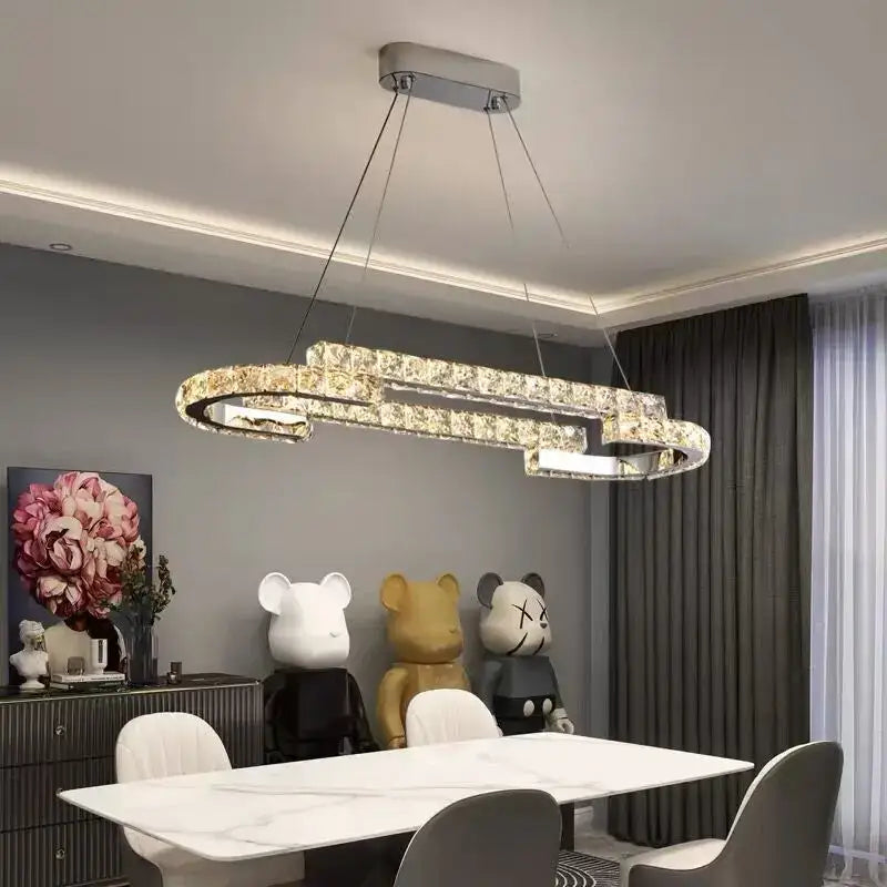 Modern chrome crystal led pendant lights featuring a sleek silver rectangular frame with embedded clear crystals