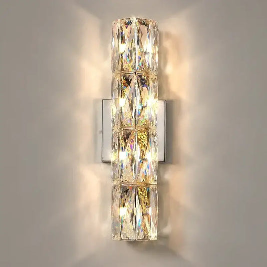 Modern chrome crystal wall light featuring a vertical stack of faceted crystals for luxury living room decorbites sconce