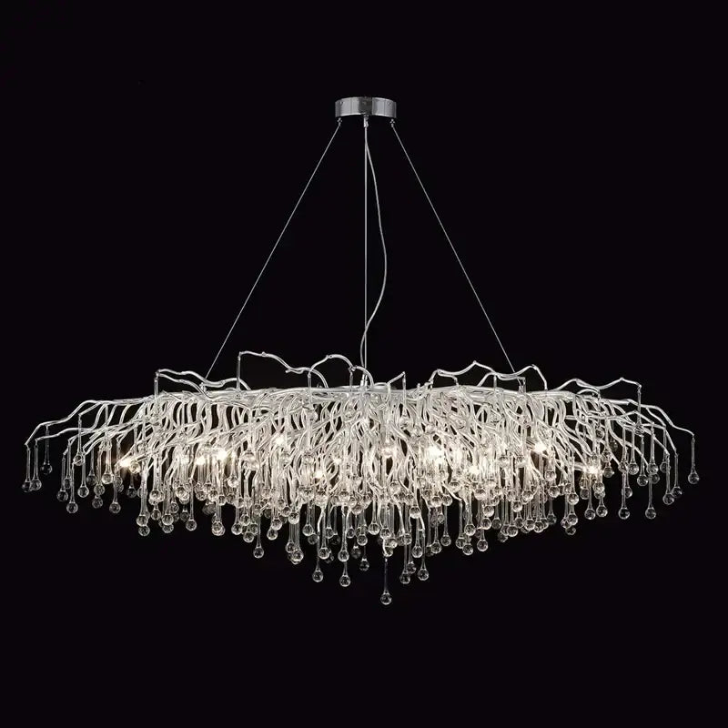 A modern chrome crystal water drop branch chandelier with glass arms and crystal droplets for living room light