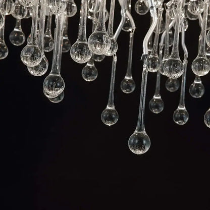 Modern chrome crystal water drop branch chandelier featuring clear glass teardrop elements with hand-blown ridges