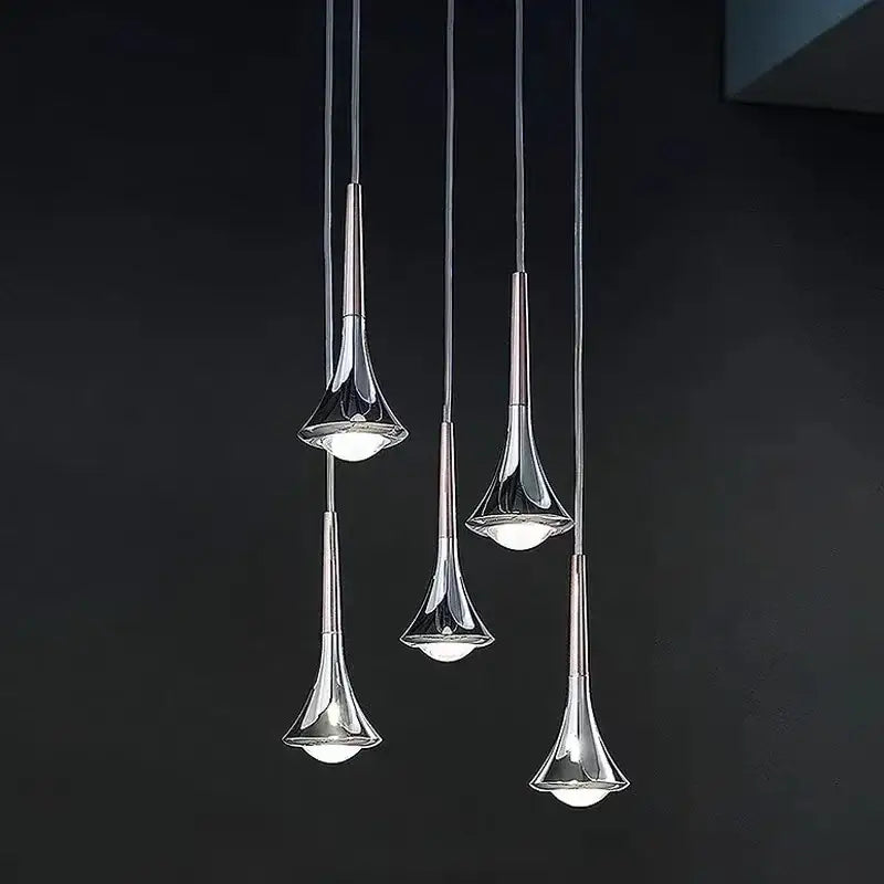 Modern chrome Decorbites LED studio pendant lights with sleek trumpet-shaped fixtures for studio rain staircase or bar lighting