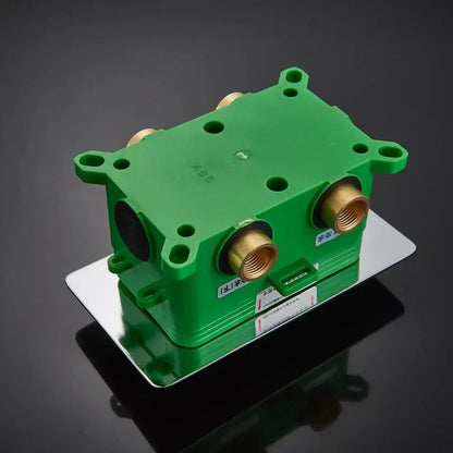 Green ABS plastic shower mixer valve with brass threaded fittings and silver mounting plate for bathroom control panel