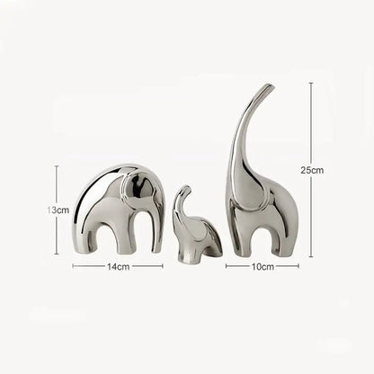 Set of three sleek polished silver ceramic elephant sculpture bookends by decorbites for modern living room decor