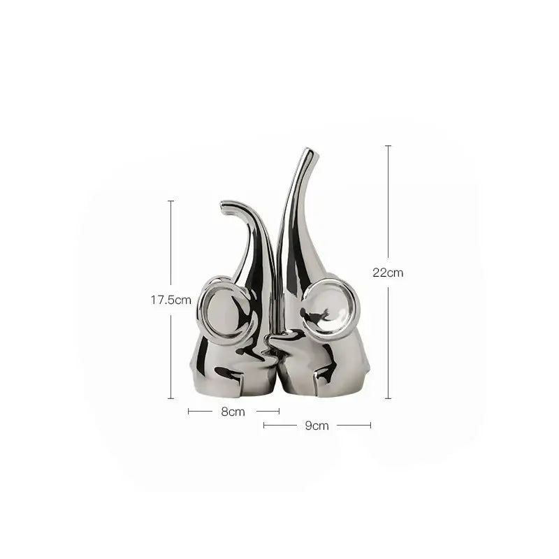 Modern chrome elephant sculpture ceramic bookends featuring shiny silver gnome figurines for living room decorbites elephant sculpture