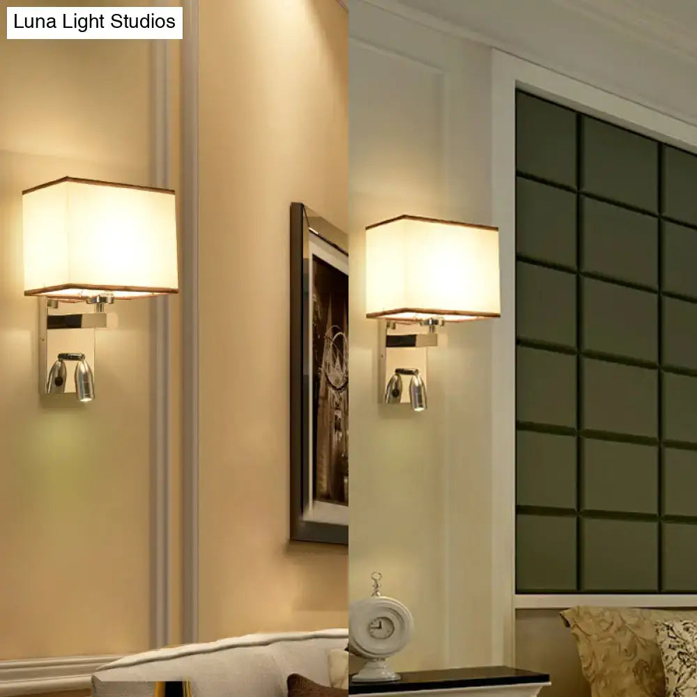 Modern rectangular direct wired electric wall sconce with cream fabric shade and polished chrome frame for bedroom lighting fixture