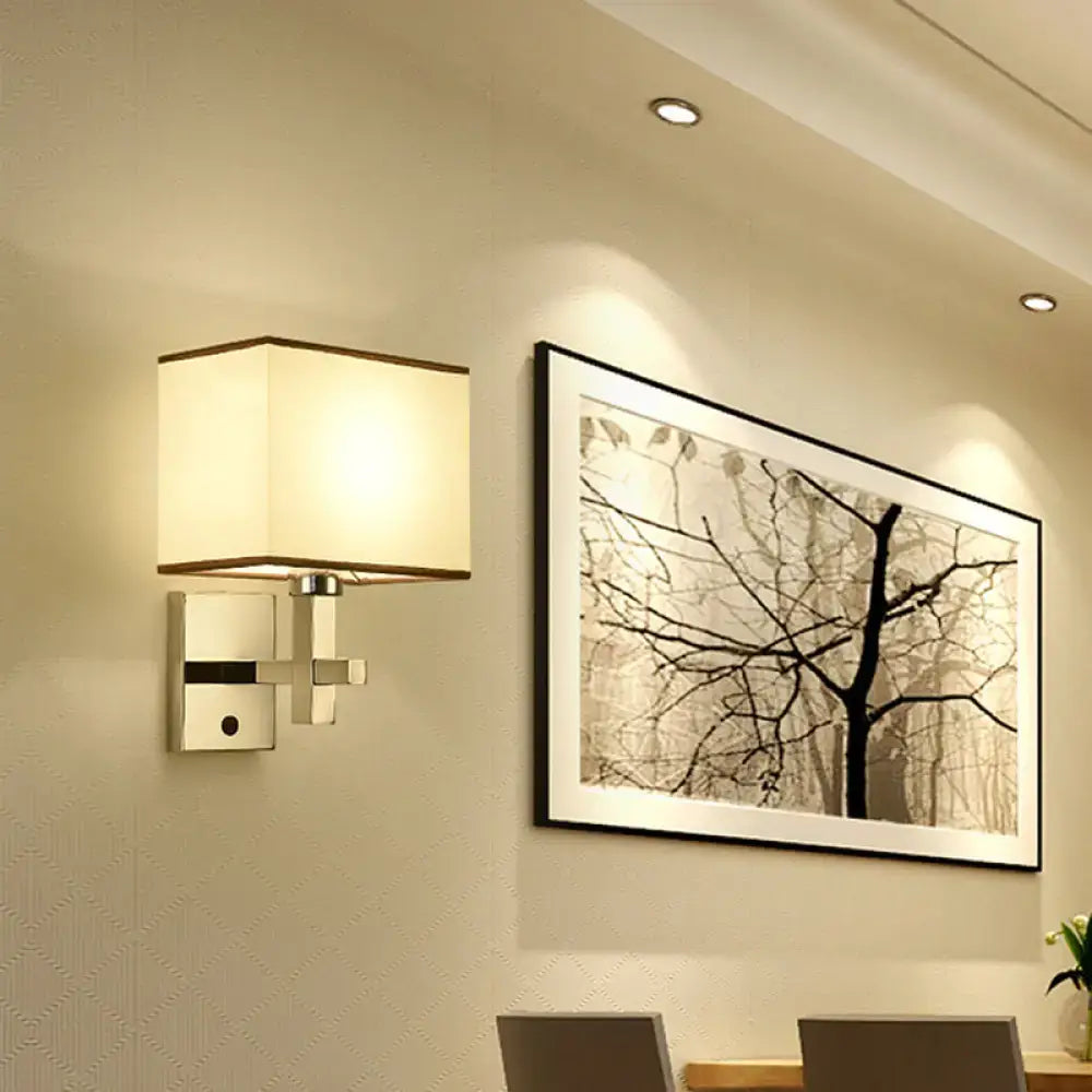 Modern chrome fabric led wall sconce with cream shade and brushed metal frame direct wired electric lighting fixture inches width