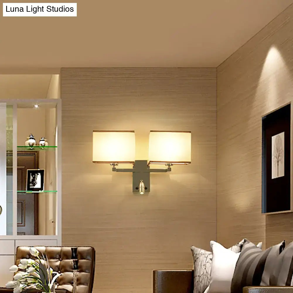 Modern chrome fabric led wall sconce with two frosted glass shades and sleek metallic frame direct wired electric lighting fixture