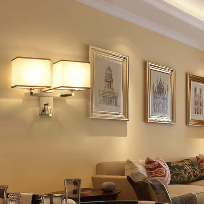 Modern chrome fabric led wall sconce with rectangular cream shades and sleek metallic base direct wired electric lighting fixture inches width