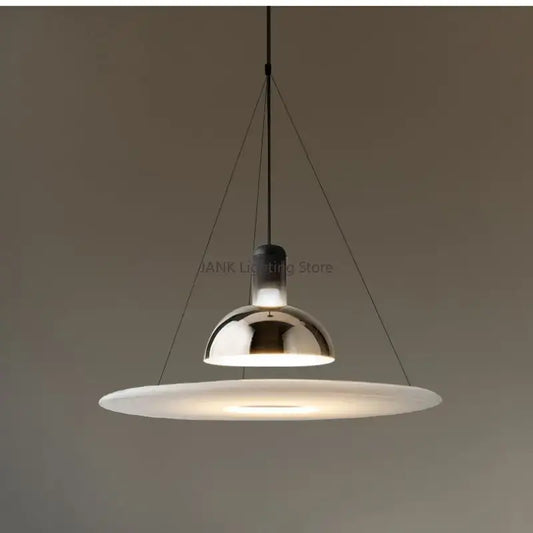 Modern chrome flying saucer chandelier with a sleek dome and wide frosted glass diffuser for living room lighting