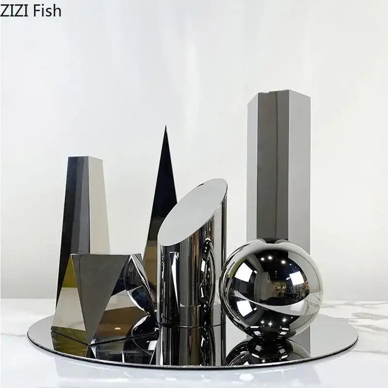 Modern chrome geometric crystal artwork polyhedron bookends with reflective sphere and prisms on mirrored base for decorbites geometric crystal decor